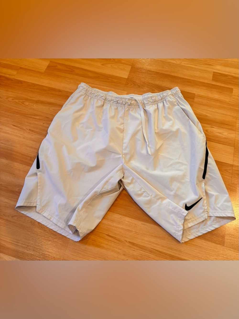 Nike Men’s White Athletic Shorts with Black Swoosh Accents